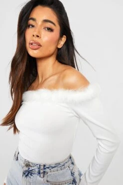 Top CÎtelé à Plumes